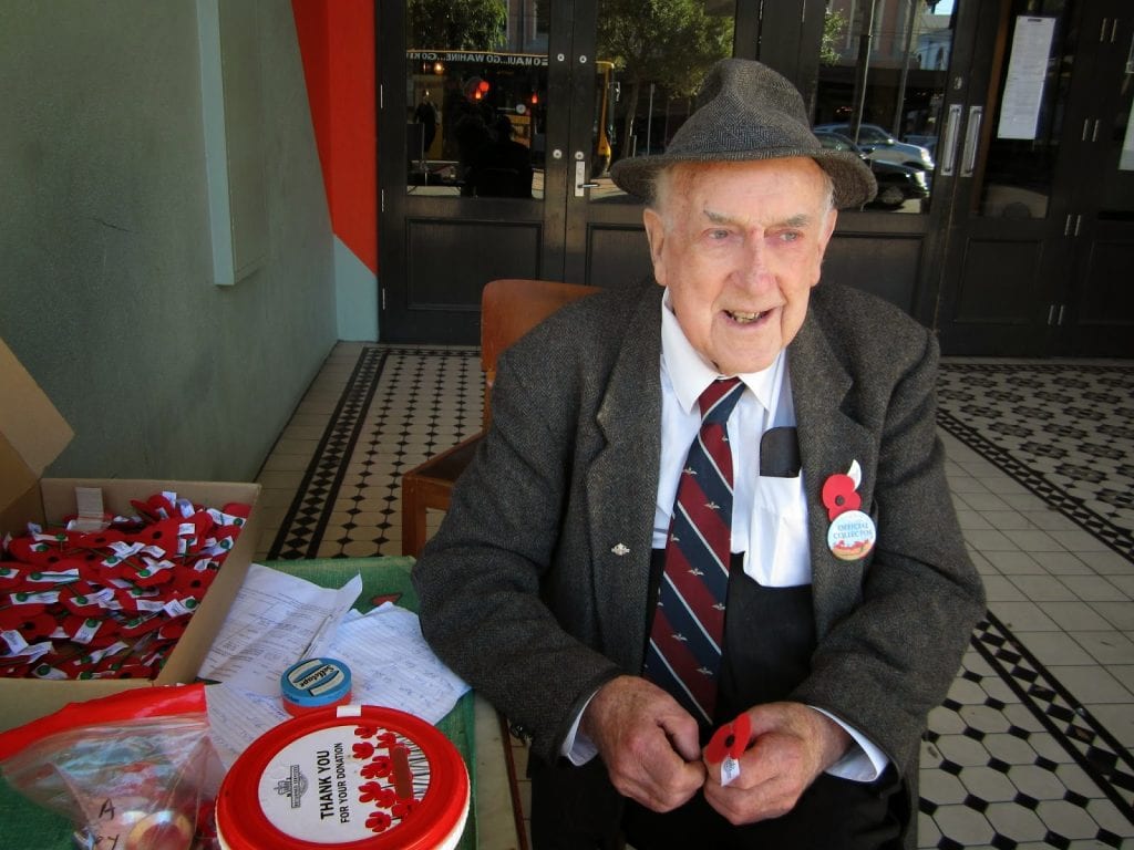 Bruce Cunningham selling poppies