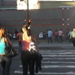 Women waiting to cross the street in Caracas