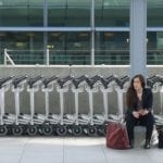 Ava sitting in paris